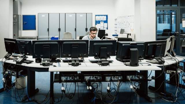 Engineer monitoring server activity