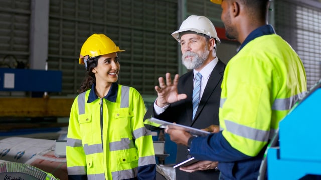 A manager showing a case study of a factory 